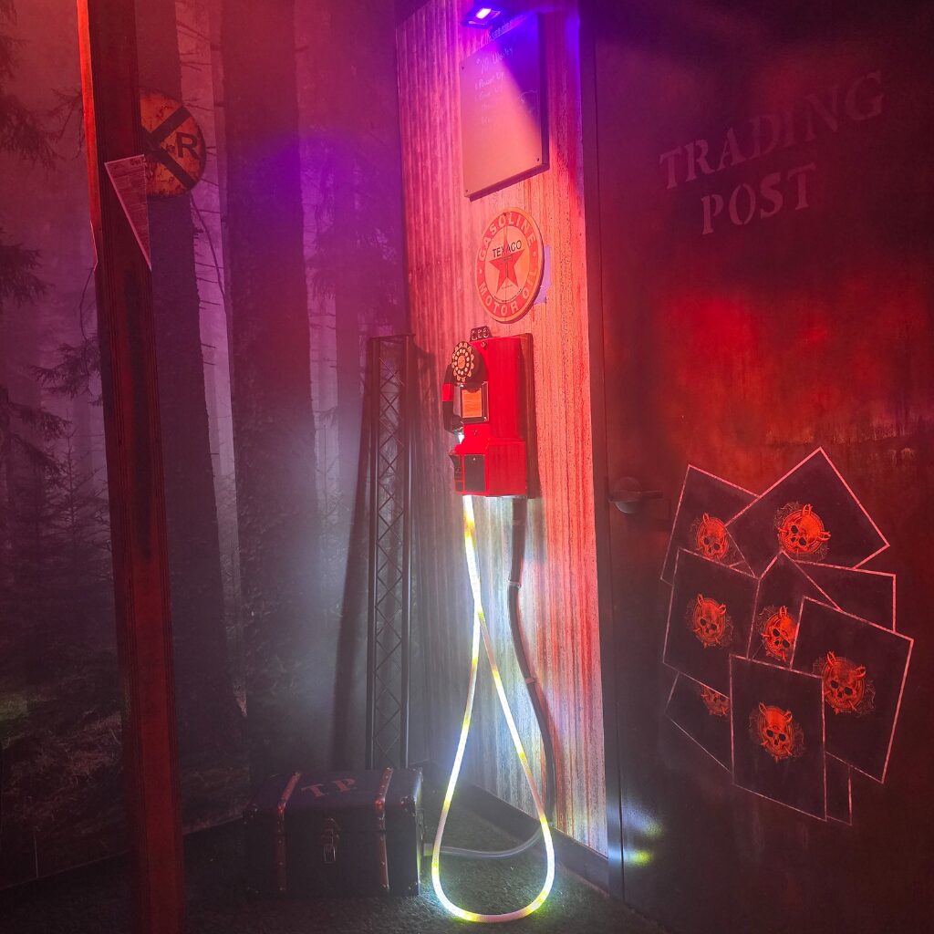 A wall phone with a glowing line